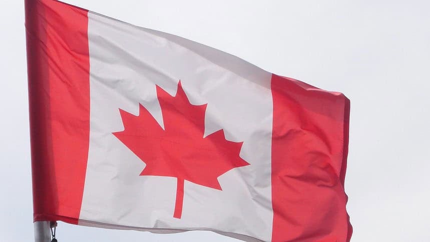 Canadian flag waving in the wind