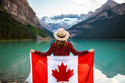 Girl holding canada flag